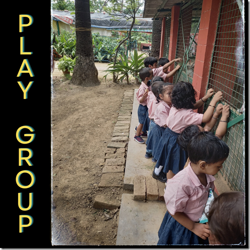 Is this a school or a botanical garden where children learn sitting in the lap of nature literally. - 28